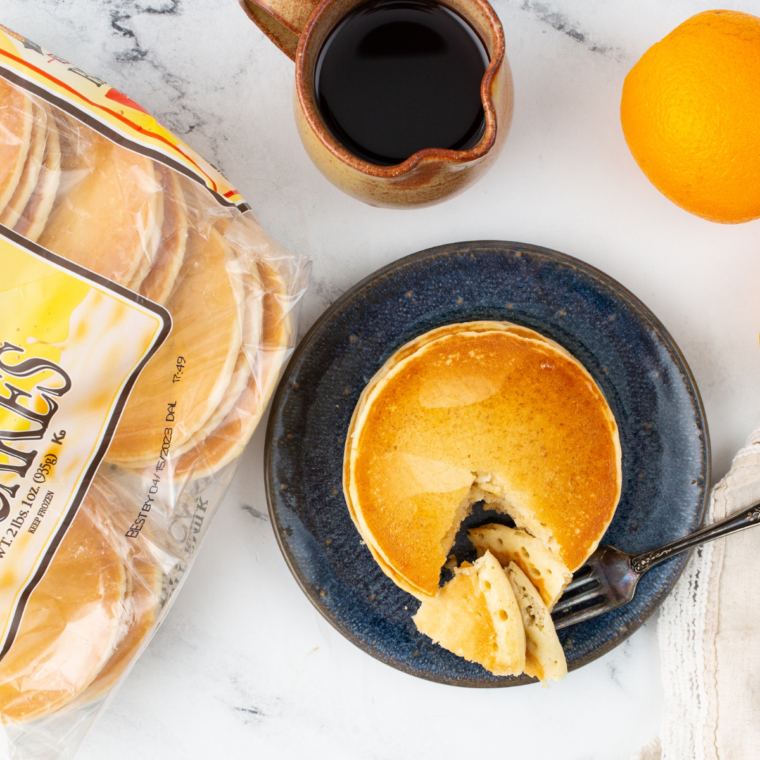 Air fryer frozen pancakes served hot with syrup and toppings