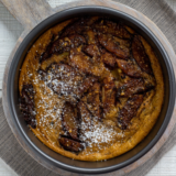 Air fryer German apple pancake puffed and golden with caramelized apples and cinnamon