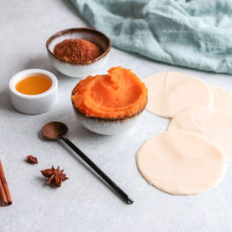 Ingredients needed for Easy Air Fryer Pumpkin Hand Pies on kitchen table.