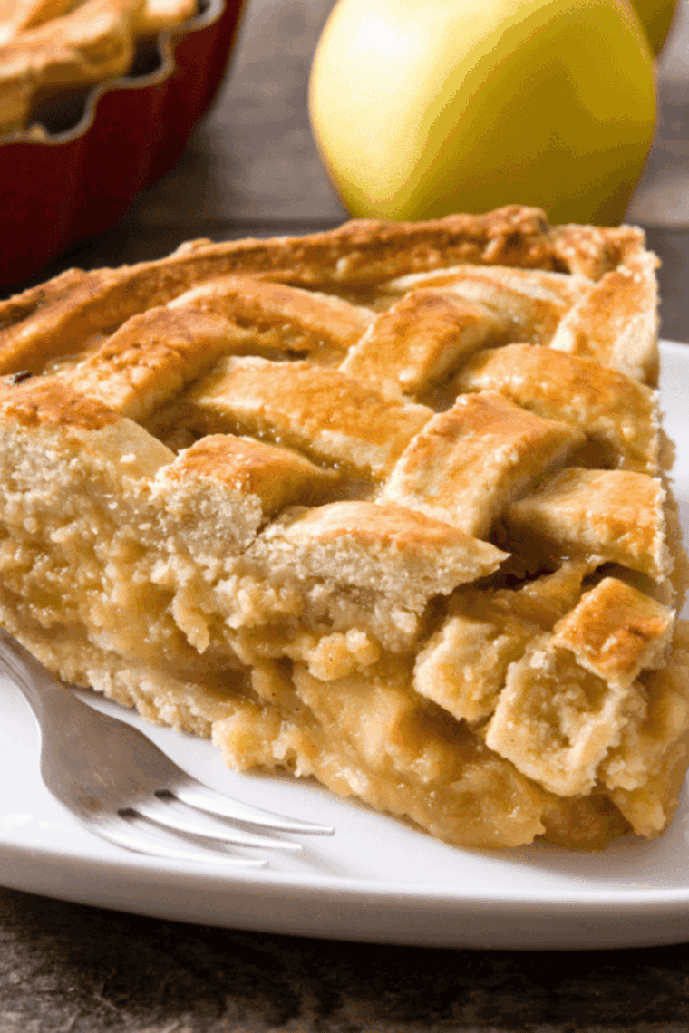 Homemade air fryer apple pie with golden flaky crust and spiced apple filling.
