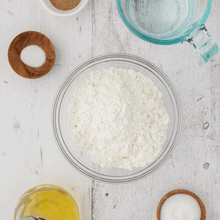 Ingredients needed for Easy Air Fryer Cinnamon Rolls from Frozen Bread Dough on kitchen table.