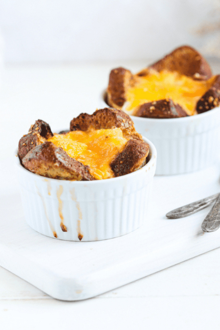 Single-serve air fryer French toast mug, golden and fluffy, served with syrup