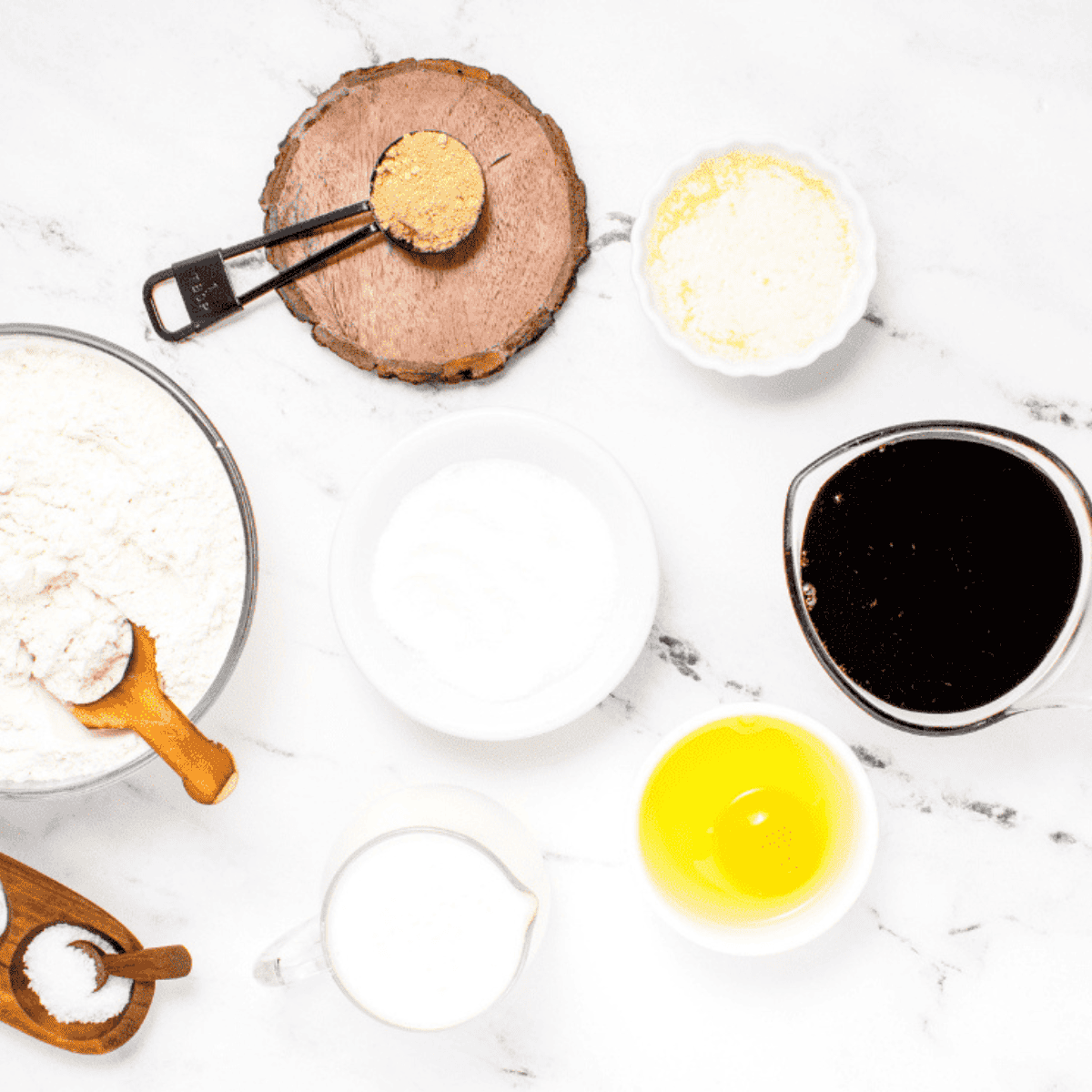 Ingredients needed for Air Fryer Gingerbread Cake on kitchen table.