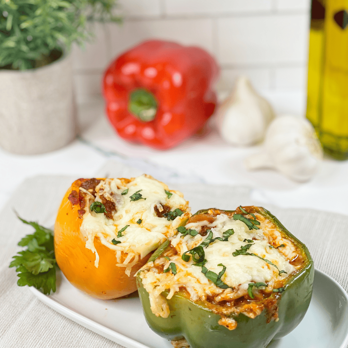 Air Fryer Lasagna Stuffed Peppers with layers of cheese, marinara, and seasoned ground beef.