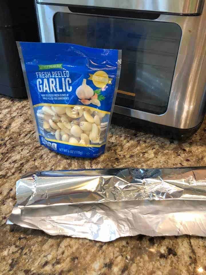 ingredients and equipment needed to make air fryer roasted garlic