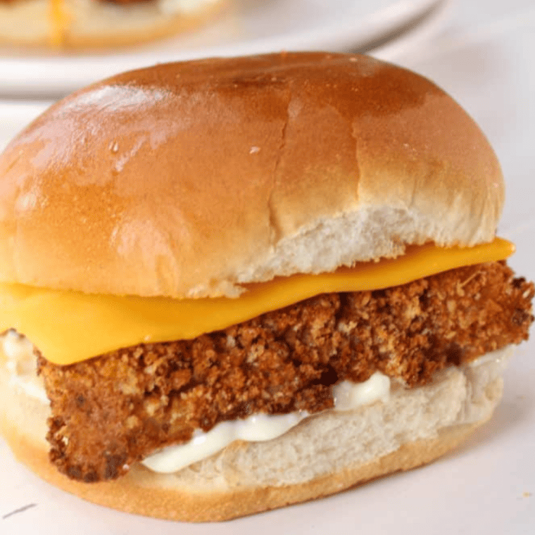 Crispy, golden Culver’s Fish Sandwich served with lettuce and tartar sauce on a bun.