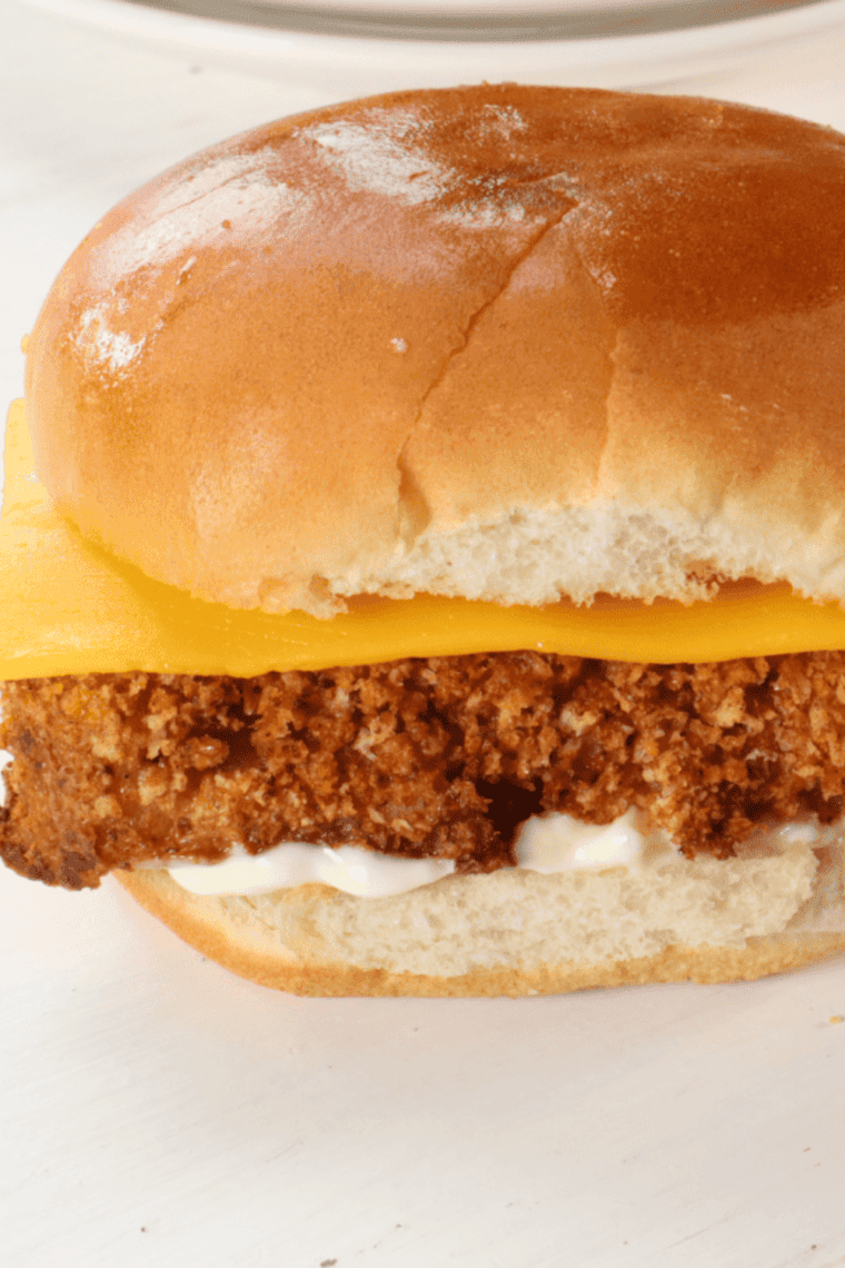Crispy, golden cod fillet served on a soft bun with tartar sauce and fresh lettuce, making a perfect Culver’s Fish Sandwich.