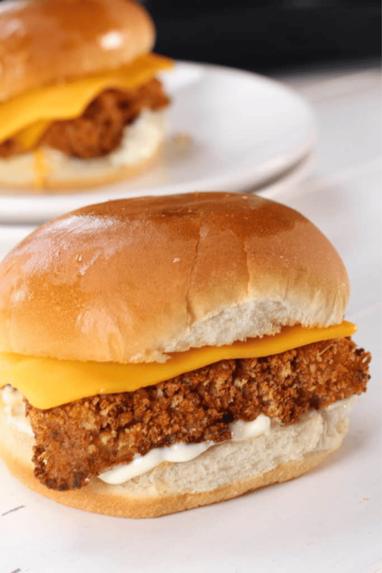 Crispy, golden Culver’s Fish Sandwich with lettuce, tartar sauce, and a soft toasted bun.