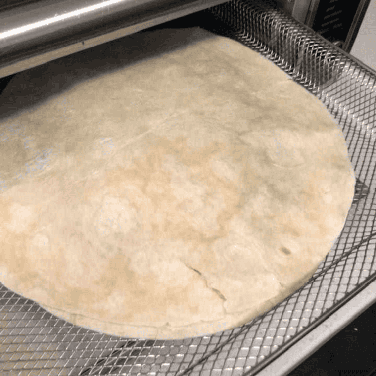 Air fry quesadilla at 350°F for 5-7 minutes, slice.