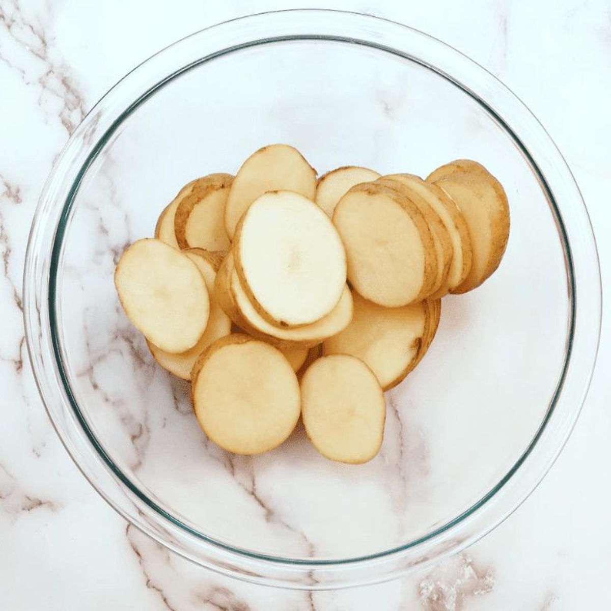 Cut your potatoes, into uniform sizes.