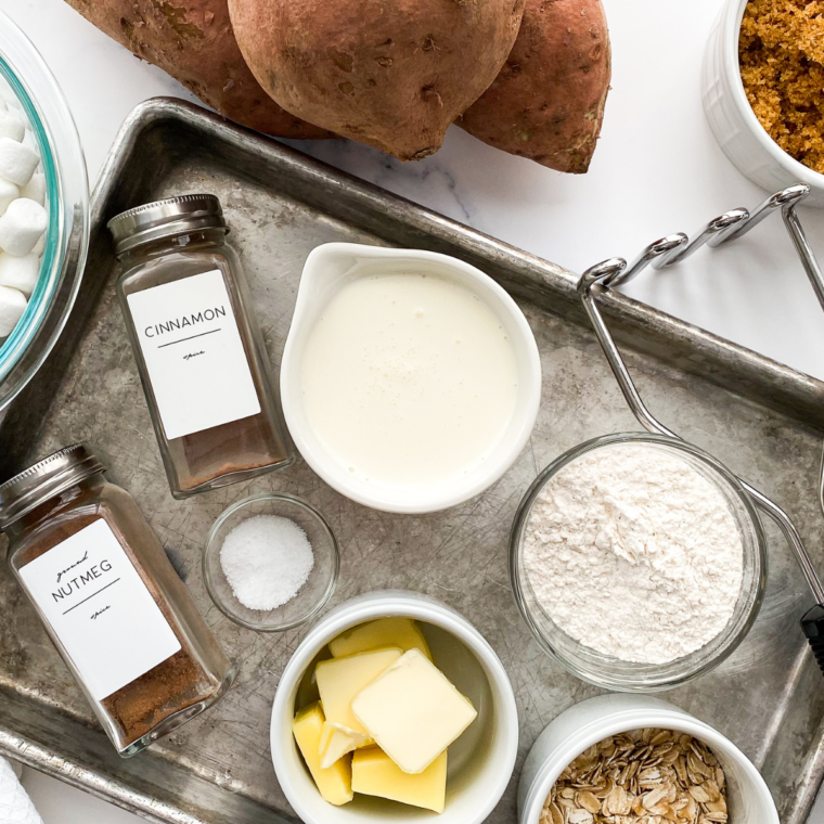 Ingredients for Boston Market sweet potato casserole: sweet potatoes, butter, brown sugar, cream, pecans, and spices.