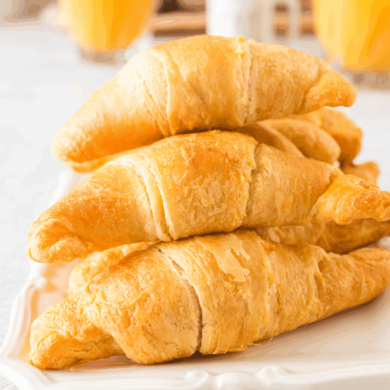 Plate of Air Fryer Cheese Stuffed Crescents Rolls on kitchen table.