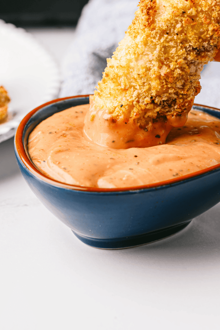 Bowl of creamy, tangy copycat Zaxbys sauce ready for dipping chicken fingers