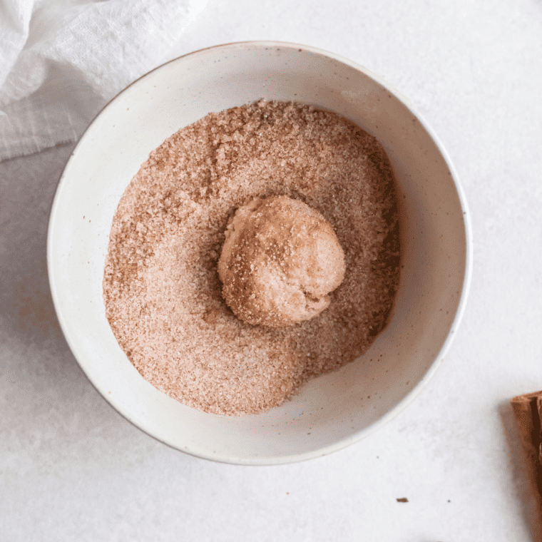 Roll the donut holes in cinnamon sugar. You can also use a variety of other flavor toppings