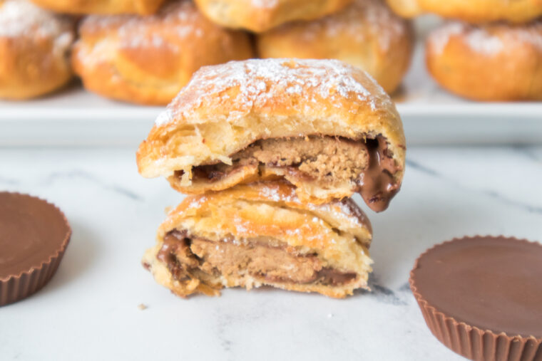 Air fryer dough wrapped Reese’s peanut butter cups cooked until golden brown with soft gooey melted chocolate center for a quick dessert