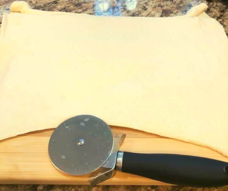 Start by rolling out the dough.