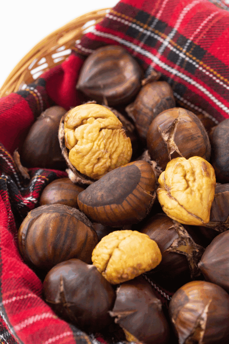 Bowl of perfectly roasted and peeled chestnuts made in an air fryer.