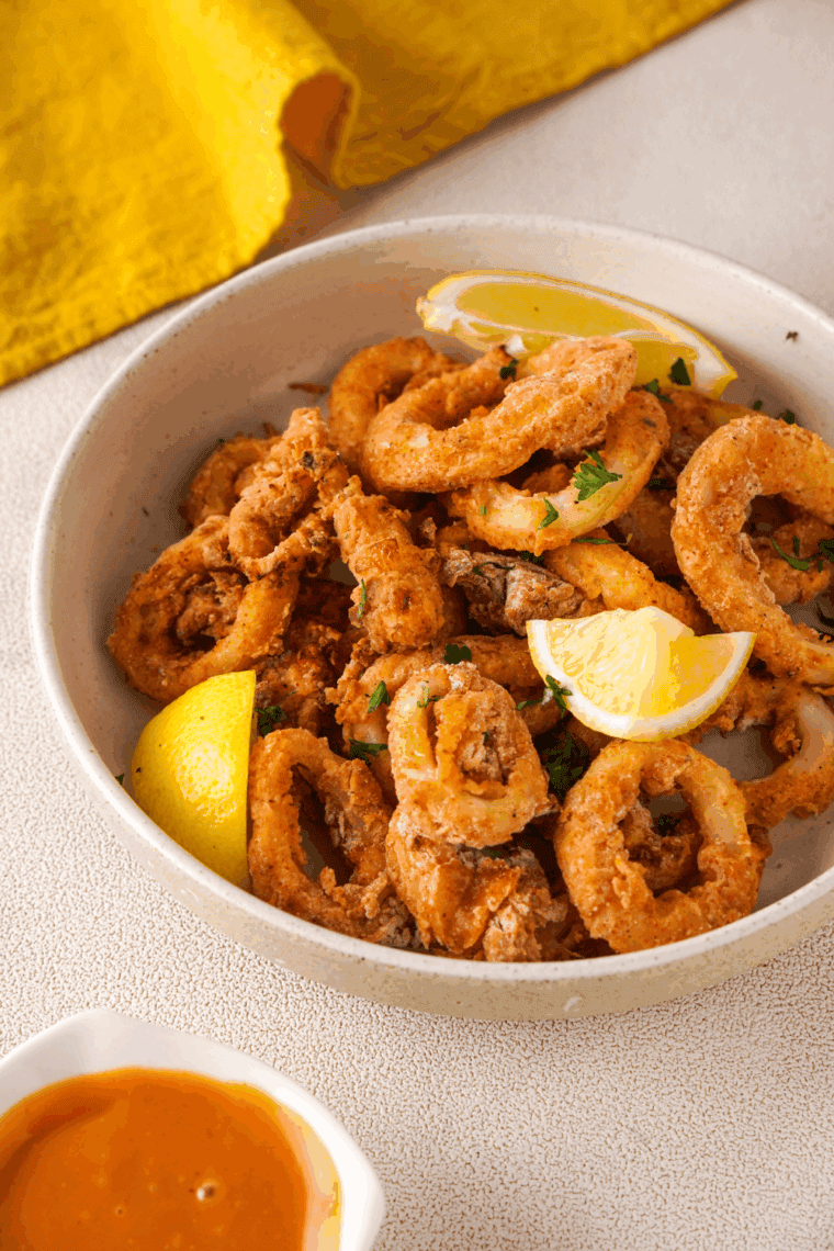 Golden fried Carrabba’s-style calamari served with marinara sauce and lemon wedges.