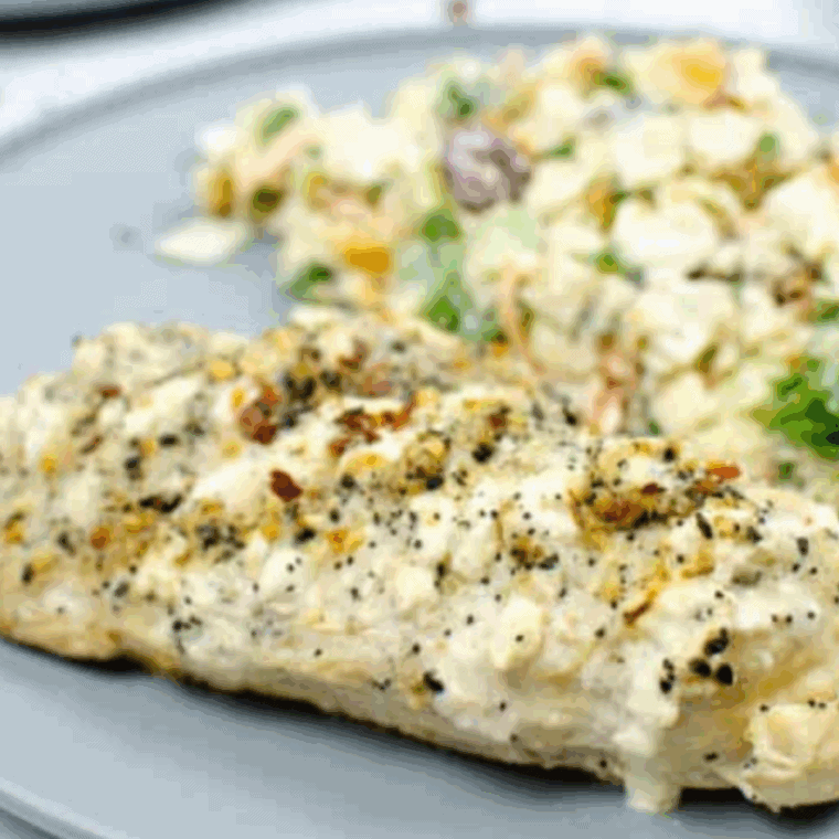 Tender Instant Pot Cream Cheese Chicken served on a plate with a creamy sauce.