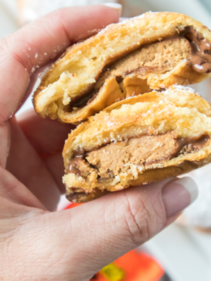 Air fryer Reese’s peanut butter cup bombs baked until golden outside with melted chocolate and creamy peanut butter center for an easy dessert treat