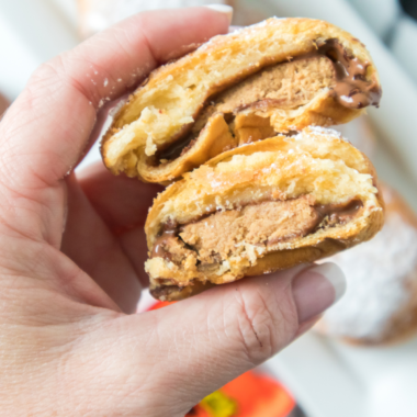 Air fryer Reese’s peanut butter cup bombs baked until golden outside with melted chocolate and creamy peanut butter center for an easy dessert treat