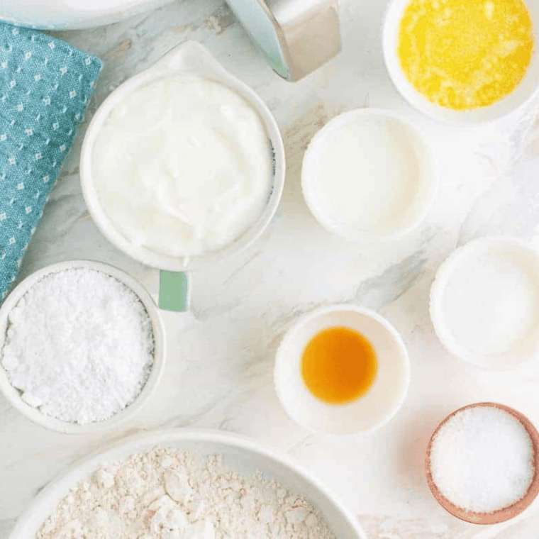 Ingredients for air fryer cinnamon swirl bundt coffee cake — cake flour, eggs, milk, butter, brown sugar, and cinnamon