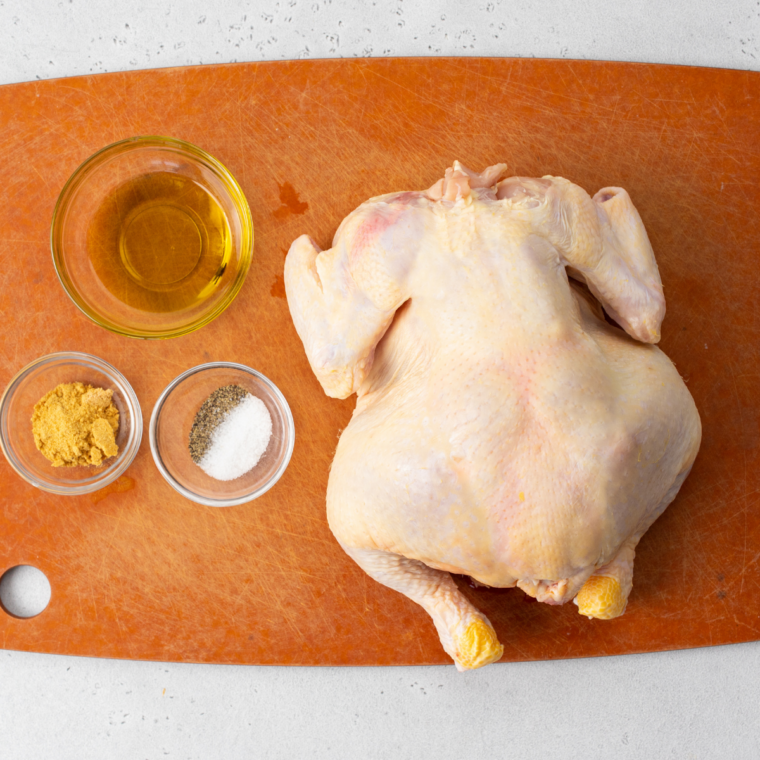 Ingredients for air fryer Cornish hens: two Cornish hens, salt, pepper, and seasonings