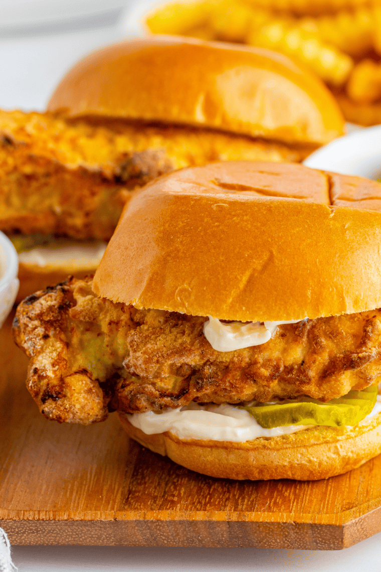 Crispy Air Fryer Popeyes Chicken Sandwich on a toasted bun with pickles, ready to serve.