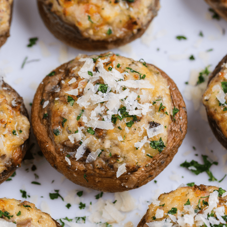 Golden-brown stuffed mushrooms filled with a cheesy, herb-seasoned mixture, just like Carrabba’s Italian Grill’s Stuffed Mushrooms Parmigiana.
