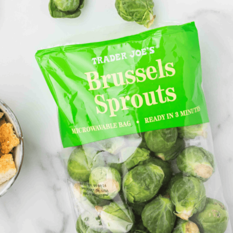 Ingredients needed for Copycat Ruth Chris Brussels Sprouts on kitchen table.