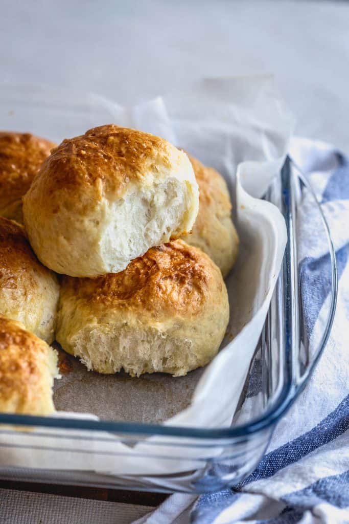 freshly baked golden brown dinner rolls in Instant Pot ready to serve