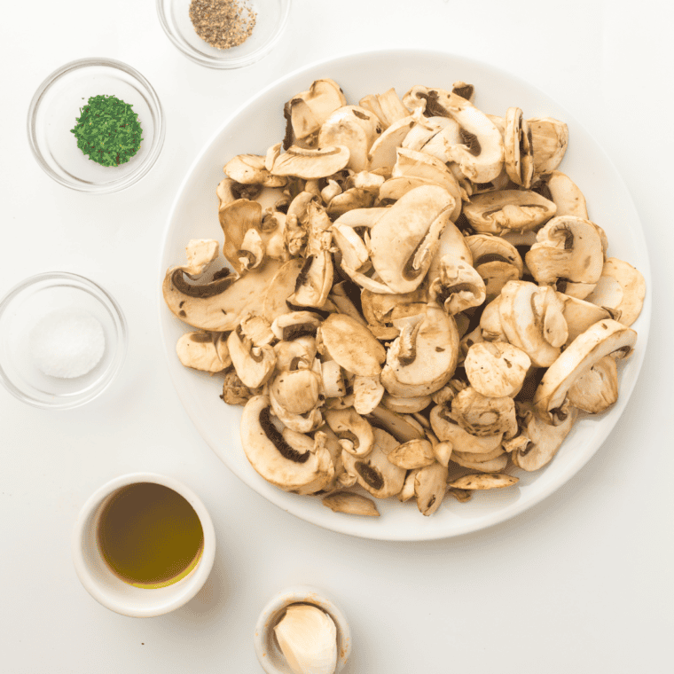 Ingredients needed for Outback Steakhouse Sauteed Mushrooms on kitchen table.