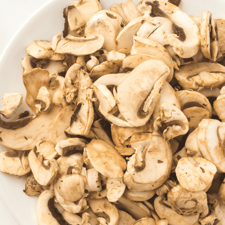 Slice the mushrooms and chop the onions for cooking.
