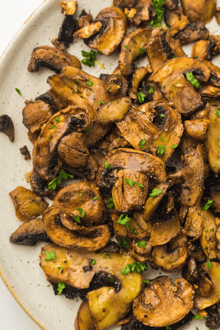 Outback Steakhouse style sautéed mushrooms with onions, seasoned with beef broth and Burgundy wine, cooked to perfection in the air fryer.
