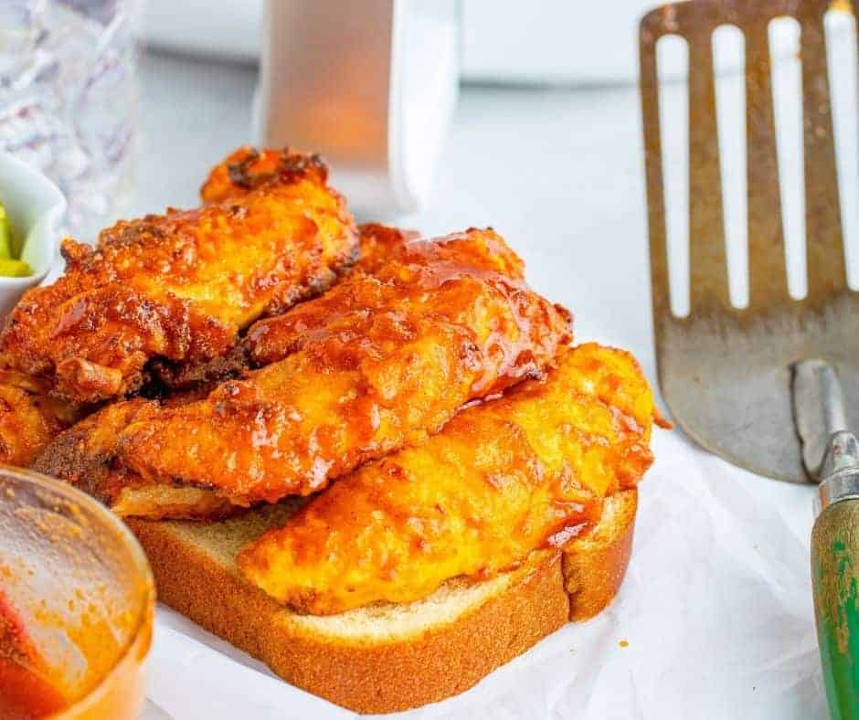 nashville hot chicken tenders on bread