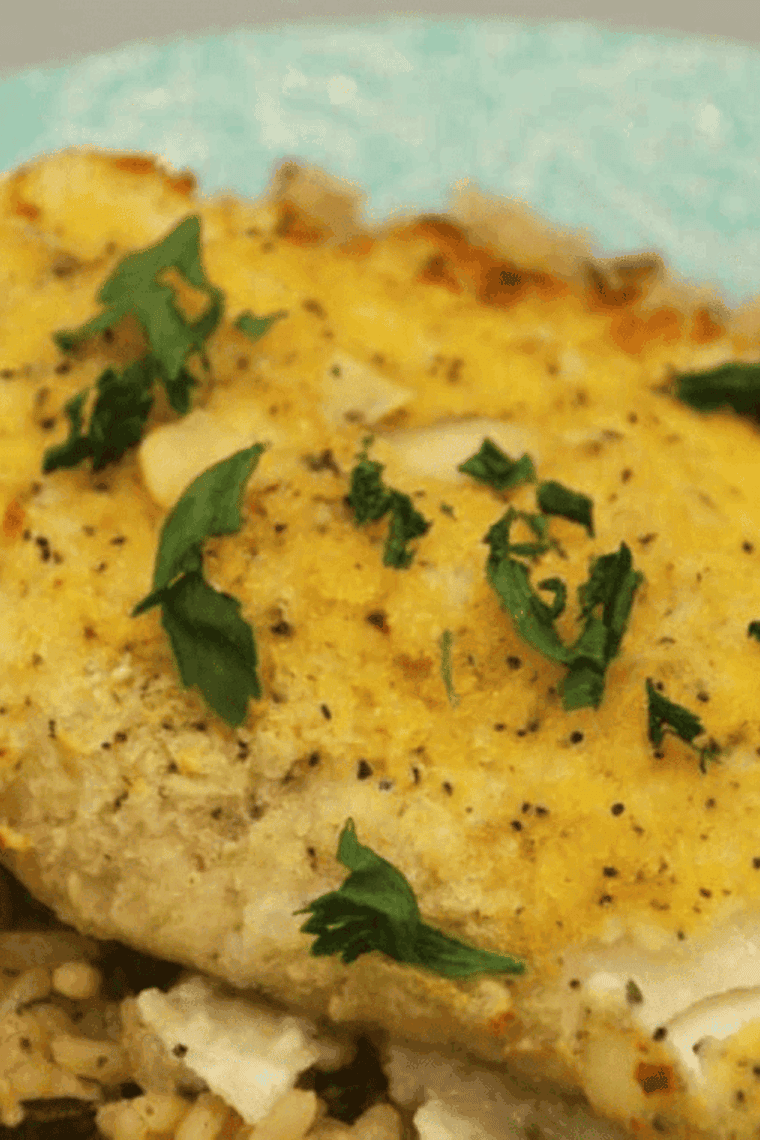 Golden almond-crusted cod fillet cooked in an air fryer, flaky and tender inside