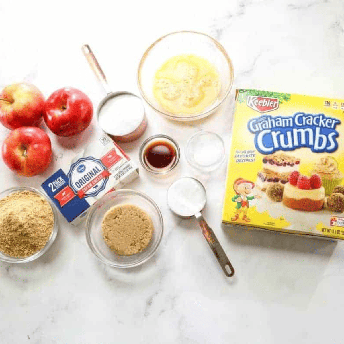 Ingredients for air fryer apple fries: apples, eggs, graham crumbs, sugar, cinnamon