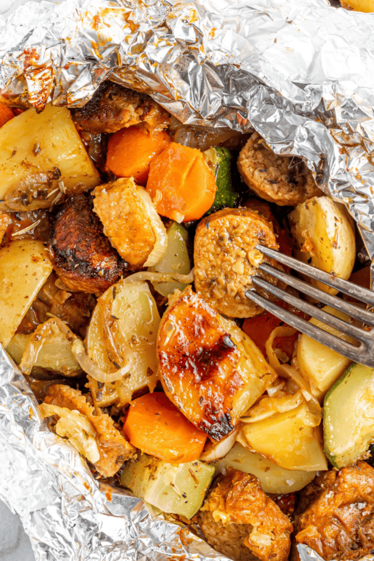 Air Fryer Beyond Sausage cooking in a basket, golden brown and ready to serve