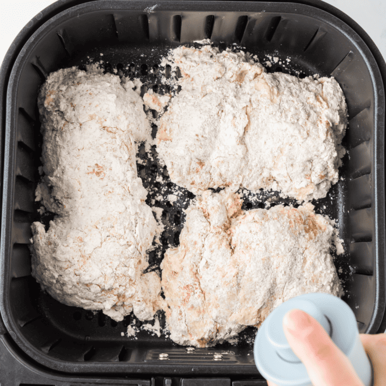 Place coated fried chicken in the air fryer basket.