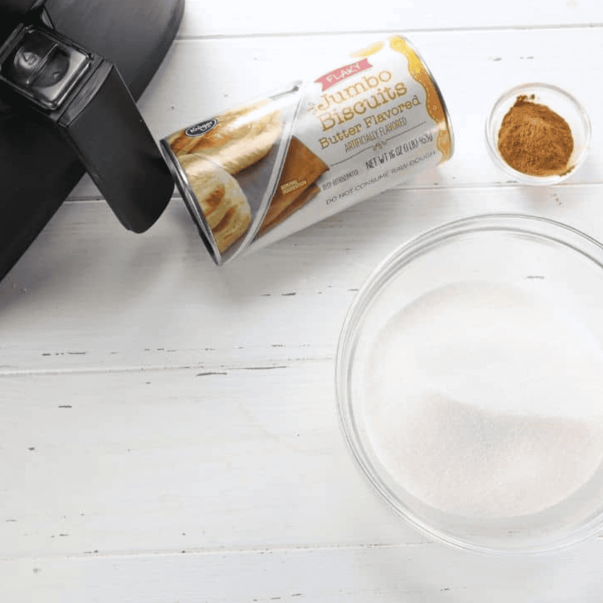 Ingredients needed for Air Fryer Cronuts Recipe on kitchen table.