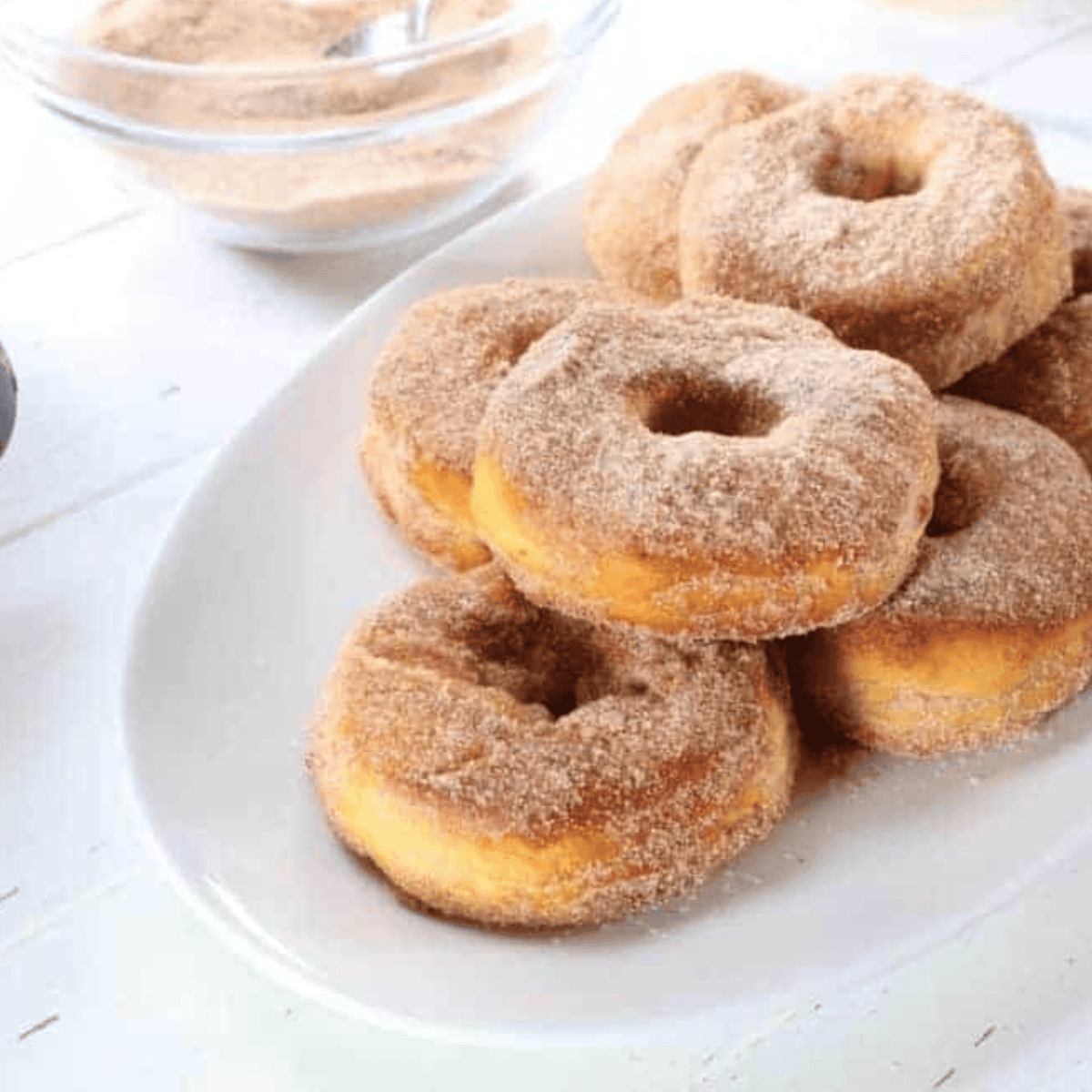 Air Fryer Cronuts made with cinnamon sugar and refrigerated biscuits for a crispy, fluffy treat.