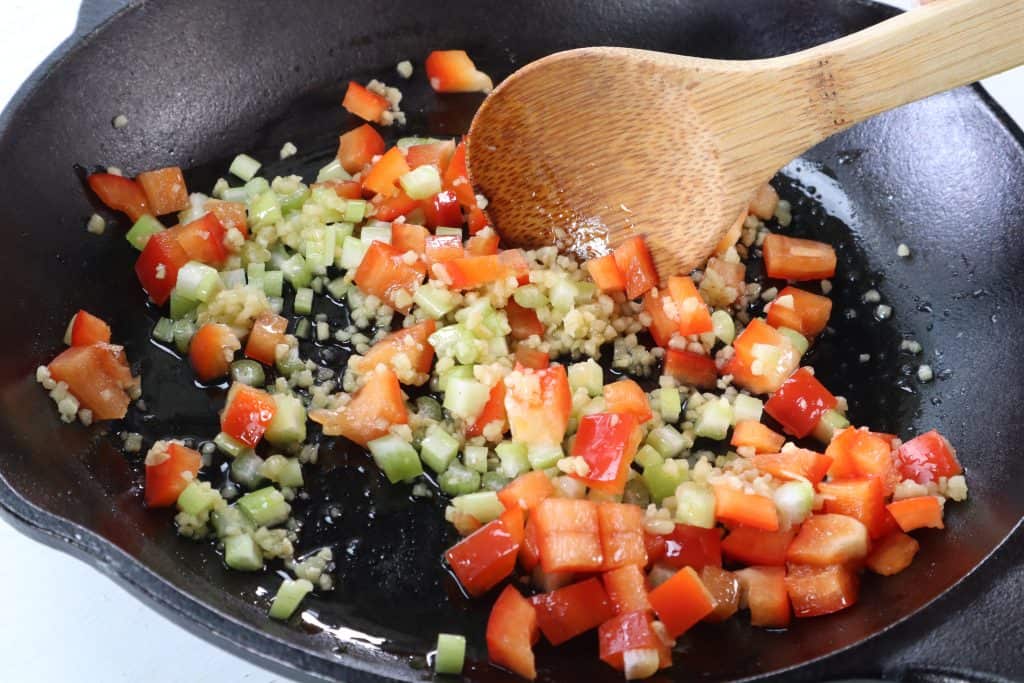 Saute Vegetables in cast iron pan.
