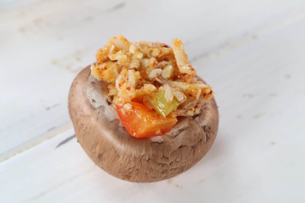 Spoon The crab mixture into the mushrooms