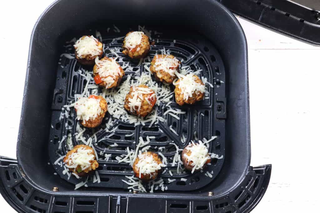 Add cheese to the mushrooms