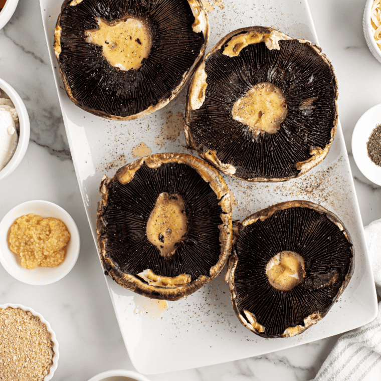 Joe’s Stone Crab Spinach Stuffed Mushrooms Recipe Ingredients on kitchen table.