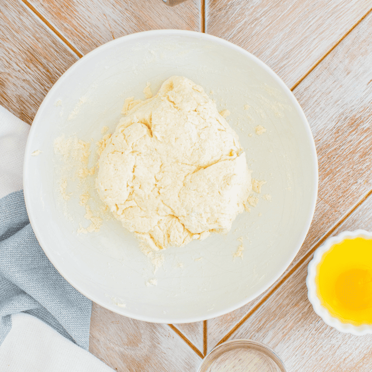 "Mixing dough for Air Fryer Bagels in a bowl"