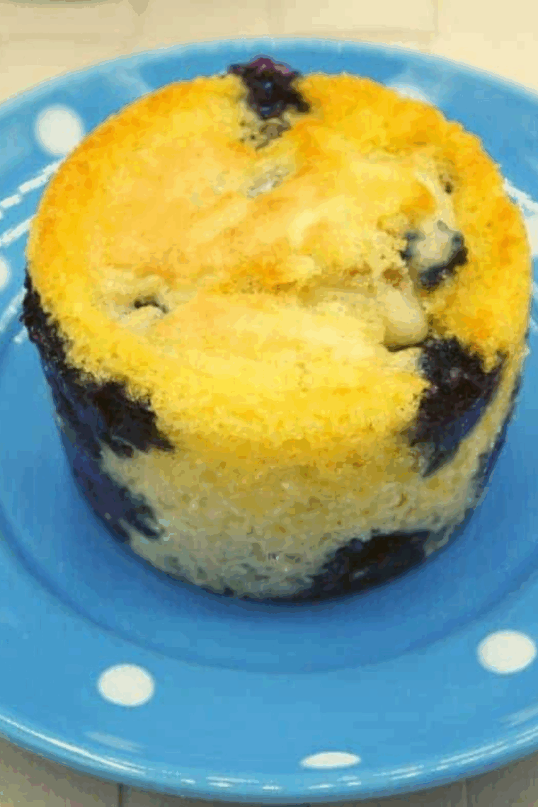 Air Fryer Blueberry Pancake Muffins fresh out of the air fryer, golden brown, fluffy, and studded with juicy blueberries.