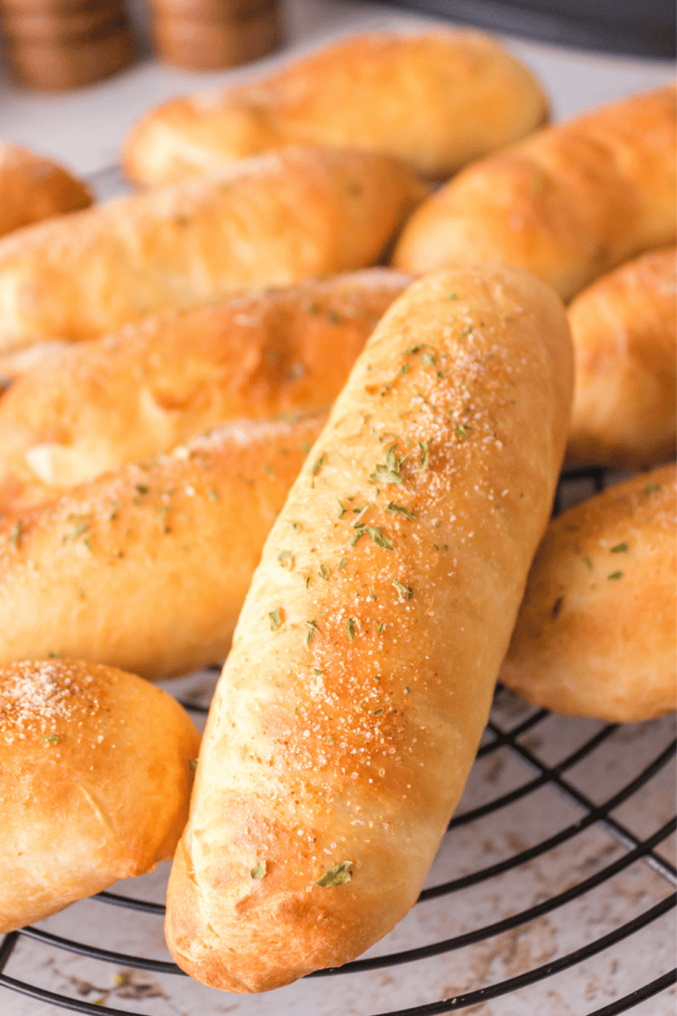 Air fryer breadsticks cooling on a wire rack