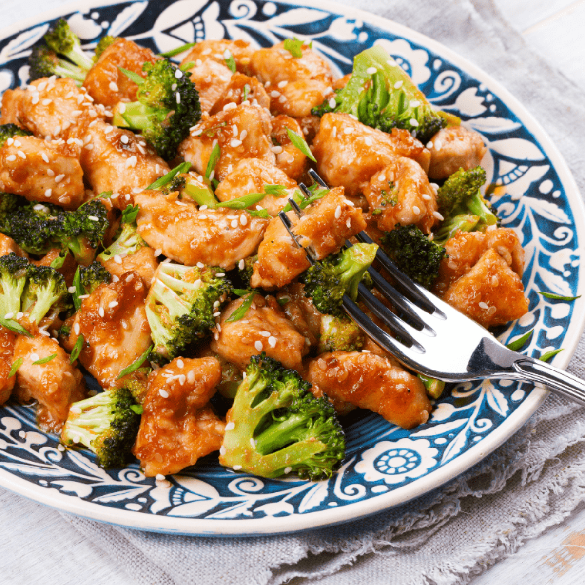 "Air fryer chicken and broccoli served on a plate"
