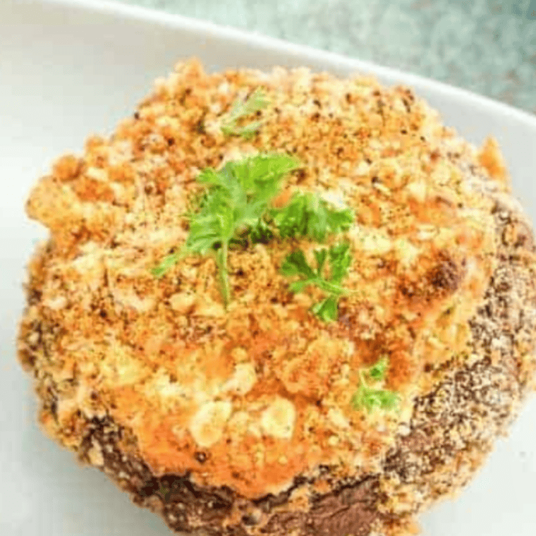 Air Fryer Jalapeno Popper Stuffed Mushrooms with creamy cheese and spicy jalapenos, cooked to golden perfection.